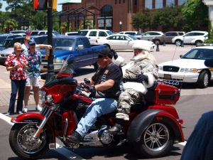 Santa, in "cammies" on a bike being cool....why not?